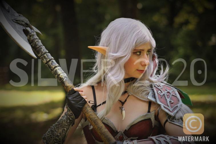 Axe, looking off, watermark